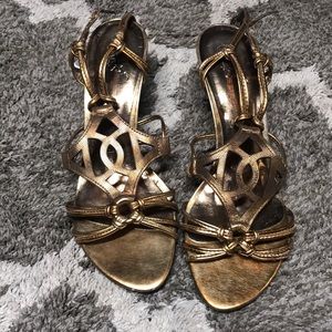 Woman’s bronze heels